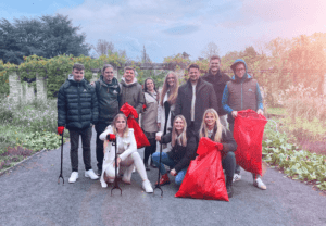 Social impact to the world: a group of working colleagues make the city clean